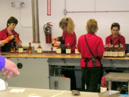 Dipping bottles in wax 
