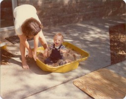 Jack in sandbox with Dodie